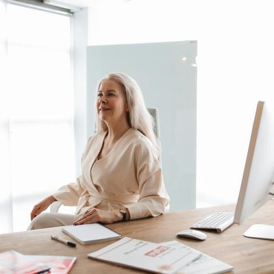 Professional female instructor smiling calmly